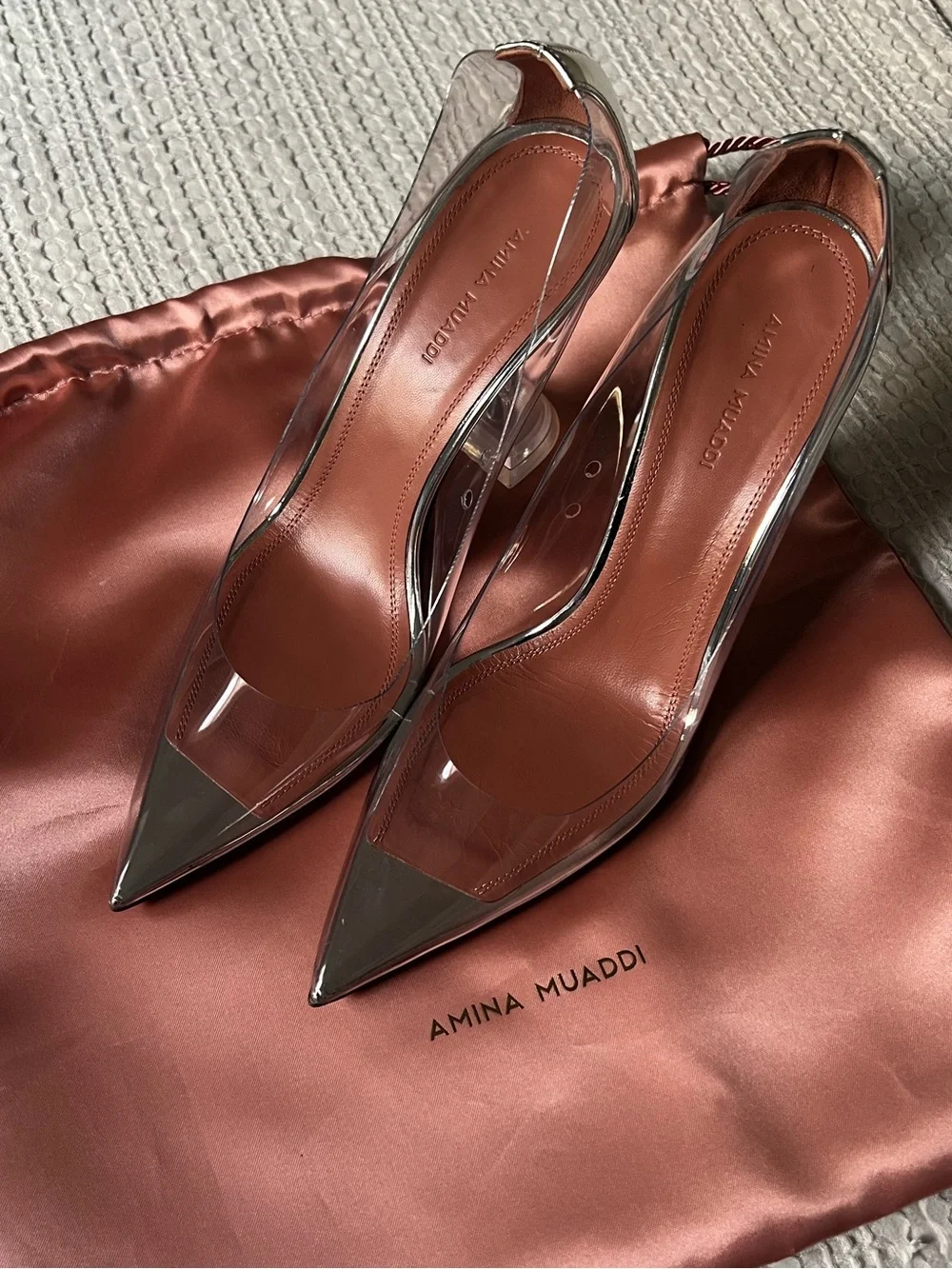 Amina Muaddi Clear PVC Pointed Toe heel with Rust Insole